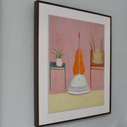 a framed Heath Hearn oil painting of a retro hoover between two tables in soft tones of pink