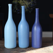trio of ceramic bottles in shades of blue by UK ceramic artist Lucy Burley