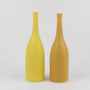 two yellow ceramic bottles by Lucy Burley, UK ceramicist.