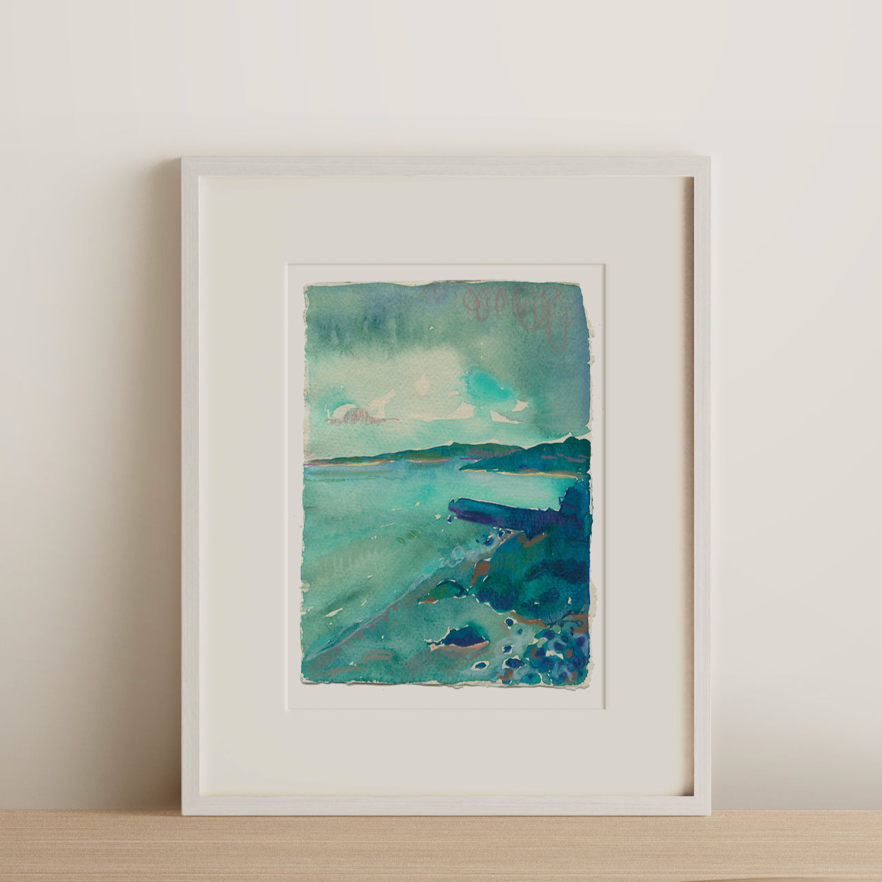 Framed Lucy Innes Williams painting seascape and headland painting in tones of blue and turquoise