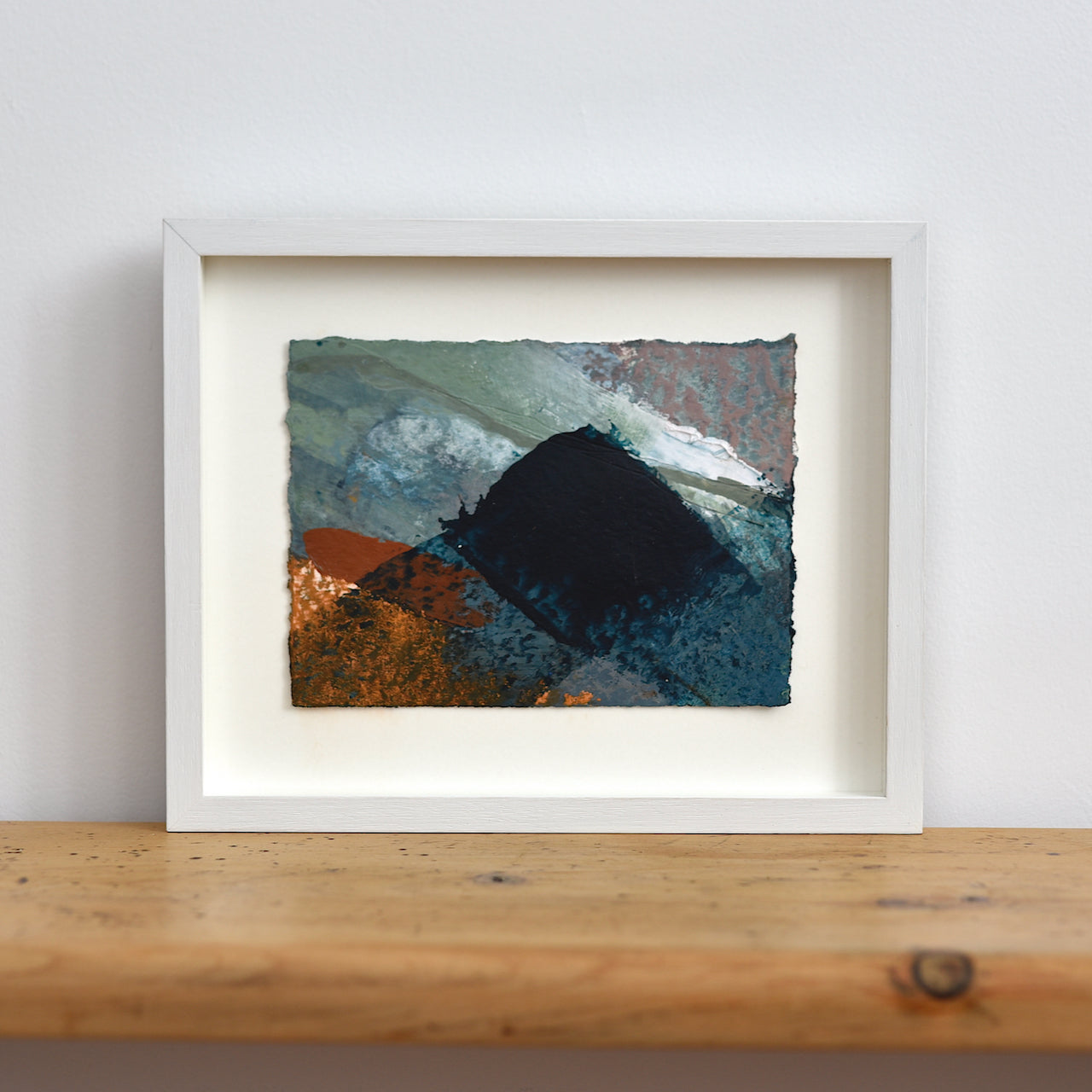 Abstract mixed media painting of blue and orange tones by UK artist Alice Robinson-Carter