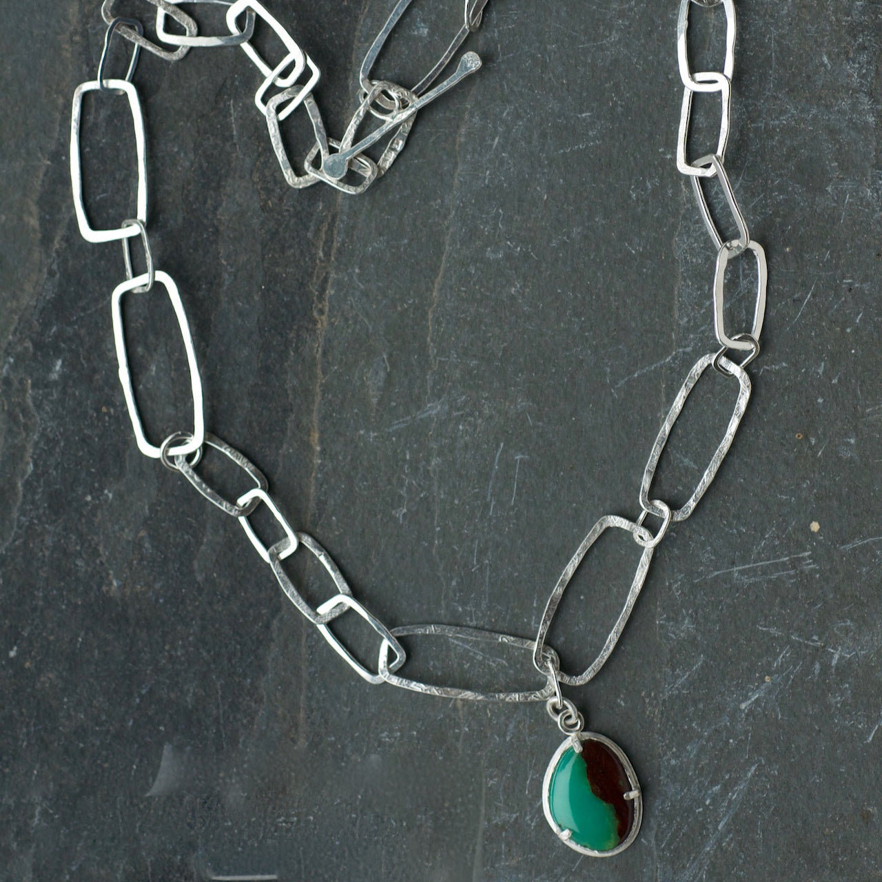 Monolith shaped silver chain link necklace with Chrysoprase Pendant by artist Lucy Spink