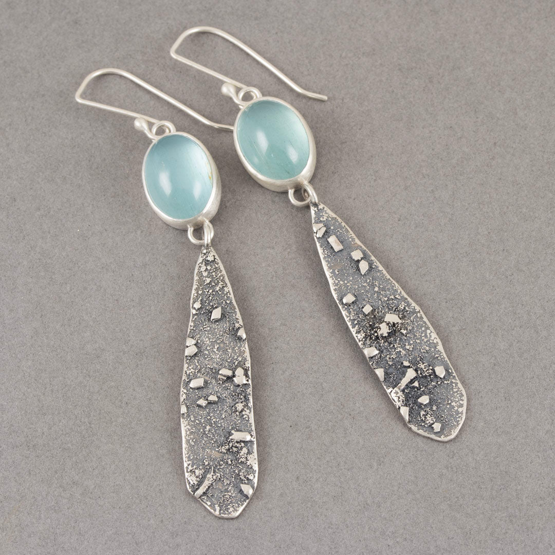 long lozenge shaped textured silver earrings with pale blue aquamarine stone setting by Uk jeweller Carin Lindberg