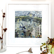 Lino print by Cornish artist Claire Armitage of swallows over lake in blue and yellow tones