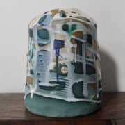 green and blue ceramic bottle by Dawn Hajittofi, ceramicist