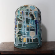 textured pale blue and turquoise ceramic bottle by Dawn Hajittofi, ceramicist .