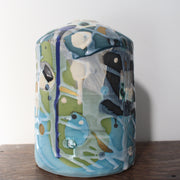 a textured pale blue and turquoise ceramic bottle by Dawn Hajittofi, UK ceramicist