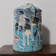 textured pale blue and pink ceramic bottle by Dawn Hajittofi, ceramicist