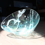irregular shaped glass vessel in clear, blue and white glass by Helen Eastham UK glass artist