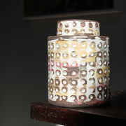 textured ceramic vessel in pinks, blues and mustard by UK ceramicist Elly Wall