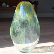 green and yellow glass vessel by glass artist Benjamin Lintell at the Byre Gallery