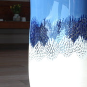 close up of a detail in a blue and white glass vessel by glass artist Benjamin Lintell