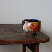 ceramic tea bowl in blues, pinks and reds by UK ceramicist John Pollex
