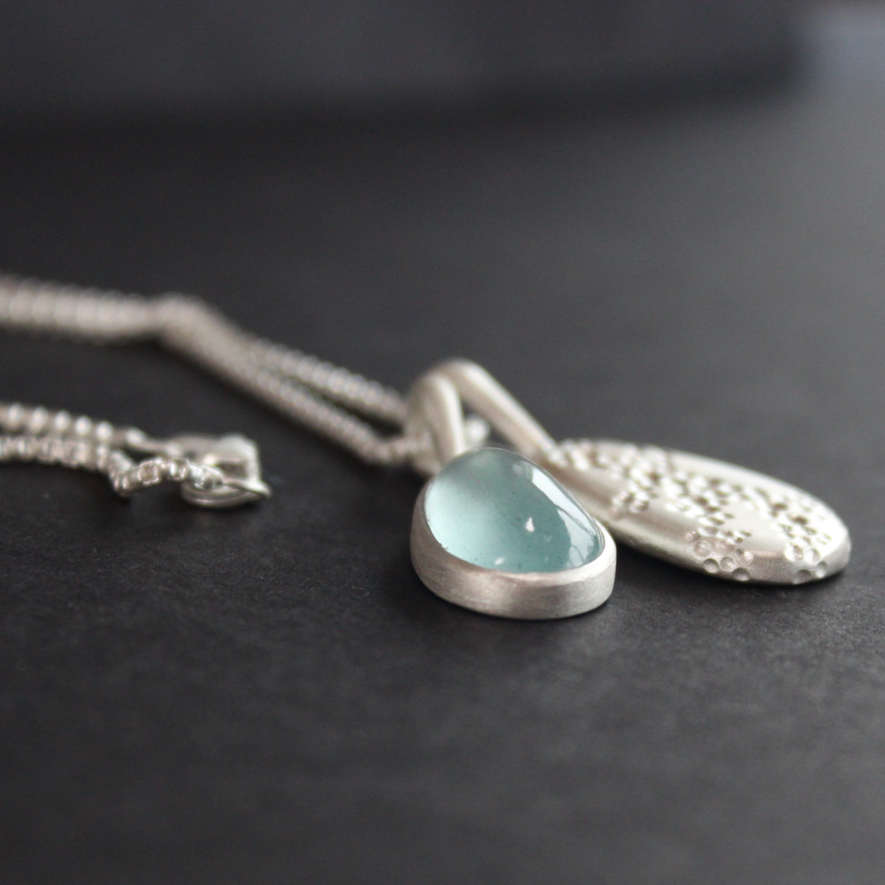 Carin Lindberg - Moss aquamarine and textured silver pebble pendants