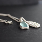 Carin Lindberg - Moss aquamarine and textured silver pebble pendants