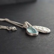 Carin Lindberg - Moss aquamarine and textured silver pebble pendants