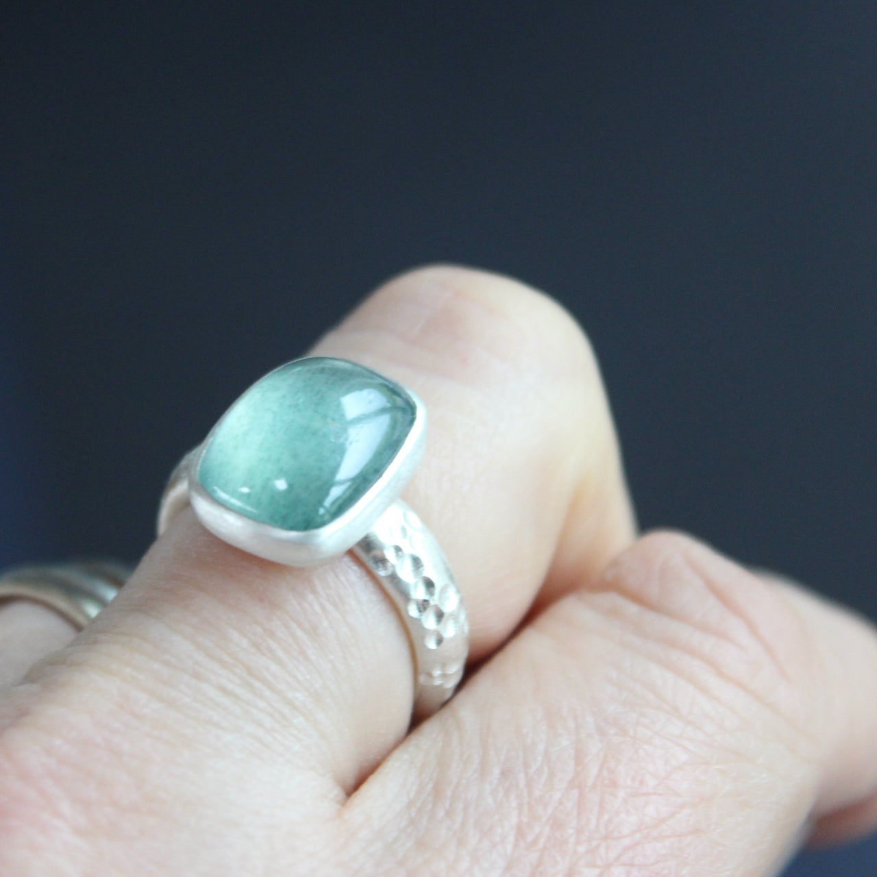 Moss aquamine textured ring in brushed silver by Carin Lindberg on finger