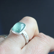 Moss aquamine textured ring in brushed silver by Carin Lindberg on finger