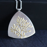 Plantae flat pendant in silver with gold tree detail by Beverly Bartlett