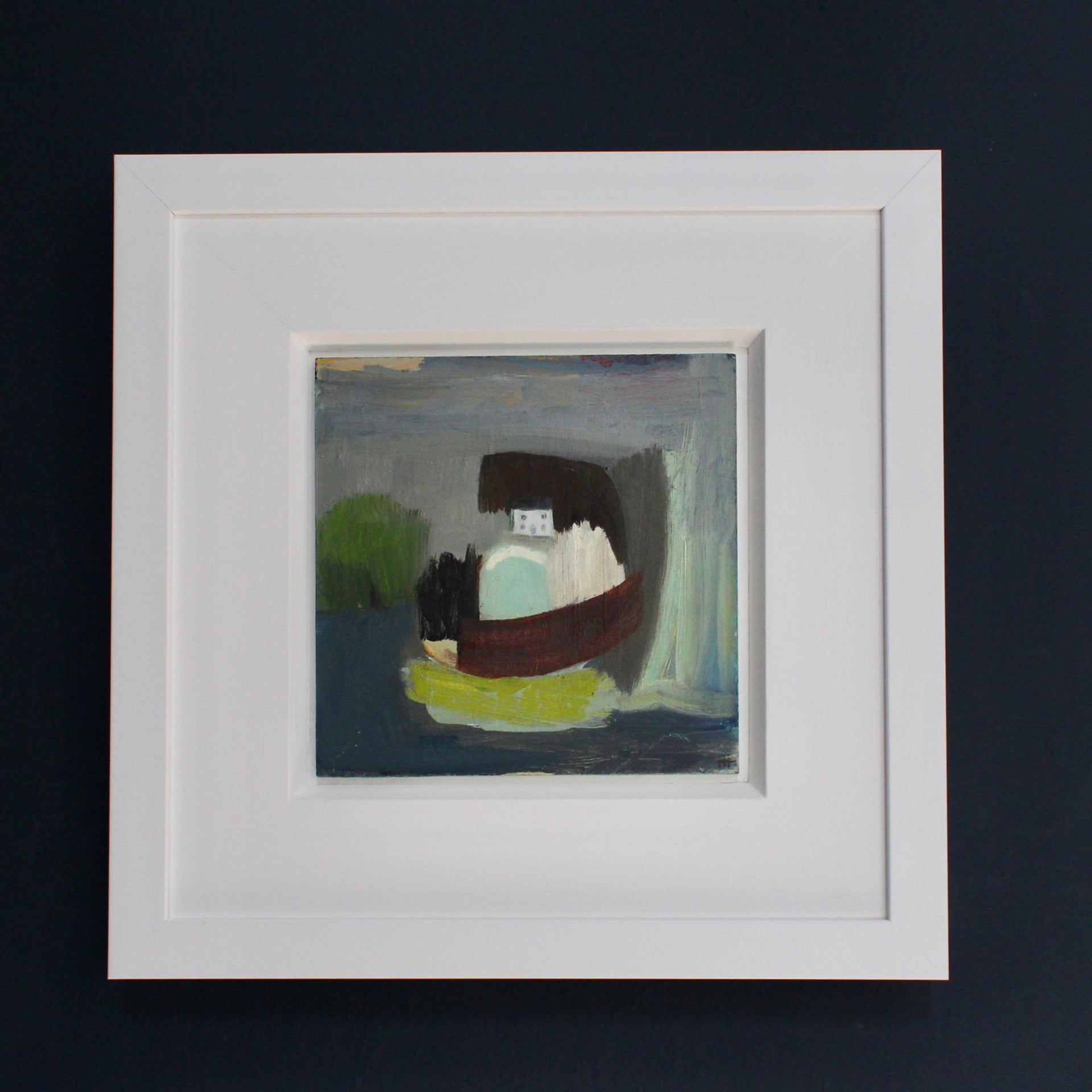 Framed abstract landscape painting by Cornish artist with white house, green tree and blue