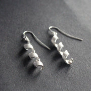 pair of silver helix twisted earrings by Beverly Bartlett by Uk jewellery designer