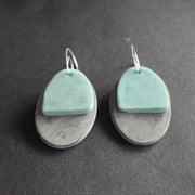 oval shaped earrings in grey and green by jewellery designer Clare Lloyd