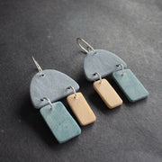 earrings in blue, turquoise and pale yellow by jewellery designer Clare Lloyd