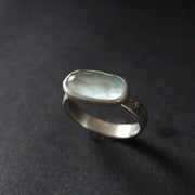textured silver ring with blue stone by jeweller Carin Lindberg