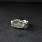 a textured silver ring with blue stone by jeweller Carin Lindberg.