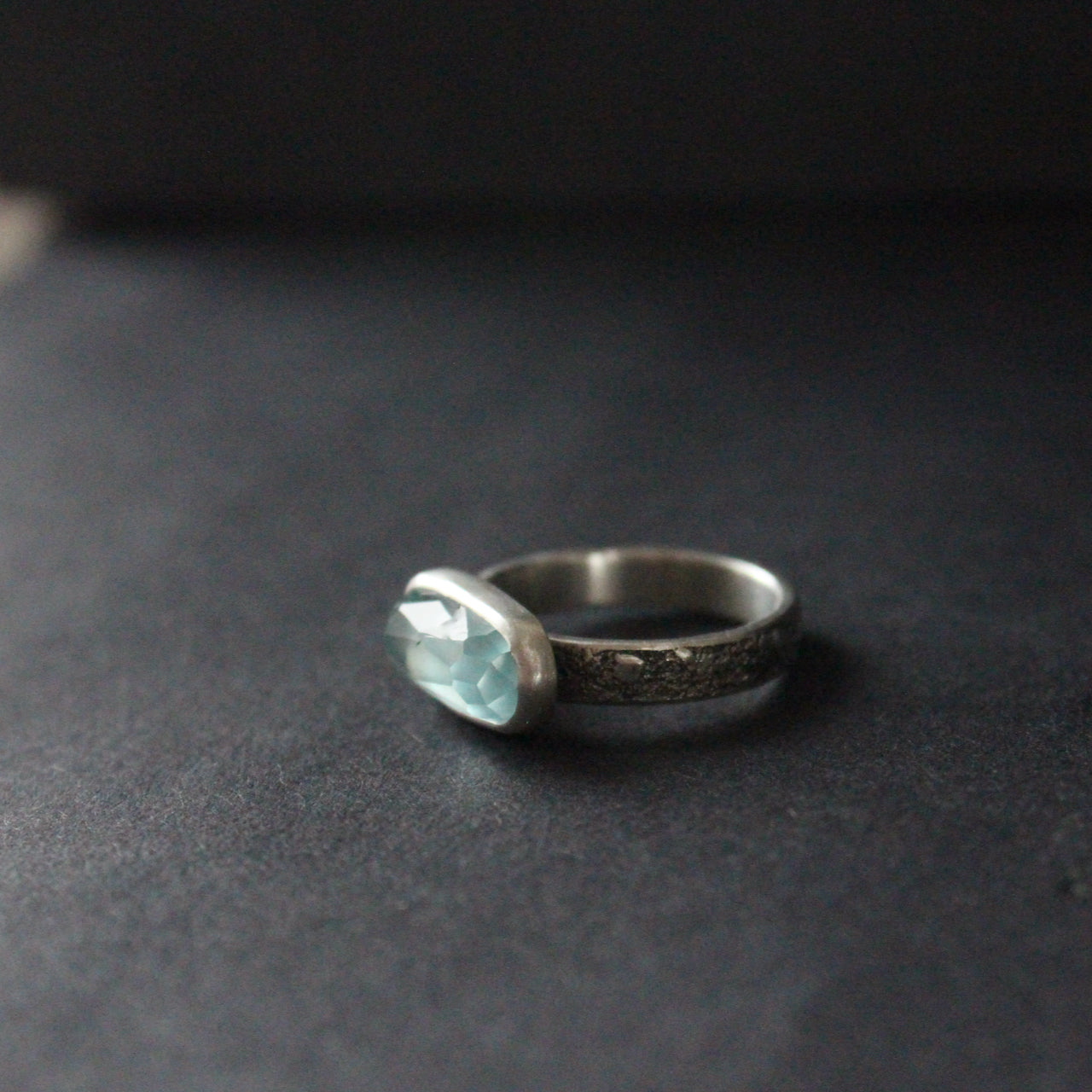 a textured silver ring with blue stone by Cornwall based  jeweller Carin Lindberg.