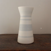 white porcelain vase with blue ring design by Uk potter Kathryn Sherriff of By the Line Pottery