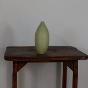 Green oval vase by UK ceramic artist Lucy Burley.