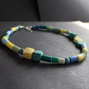 random shaped necklace in blues and greens by Clare Lloyd,  Jewellery Designer.