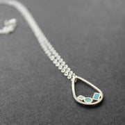 Clare Lloyd silver necklace with blue details