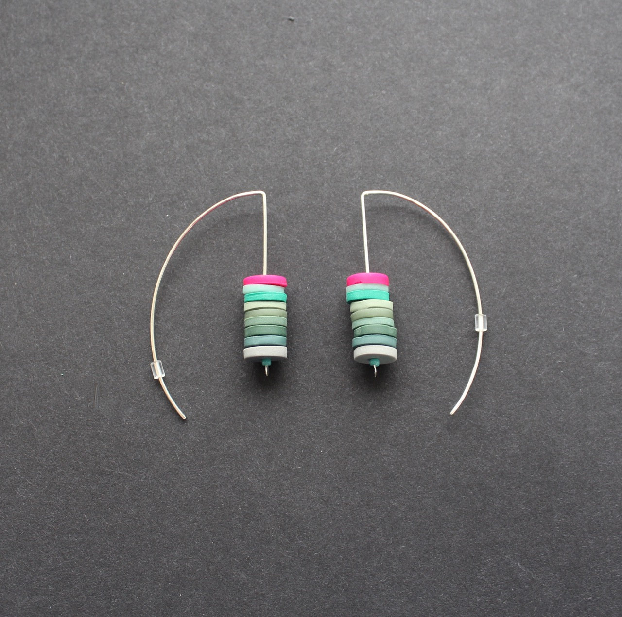 stacked disc earrings in soft greens and cerise