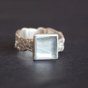 silver ring by Cornwall Jeweller Carin Lindberg with a square set pale blue aquamarine stone