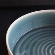 interior detail of blue glazed porcelain serving dish by Kathryn Sherriff of By the Line Pottery