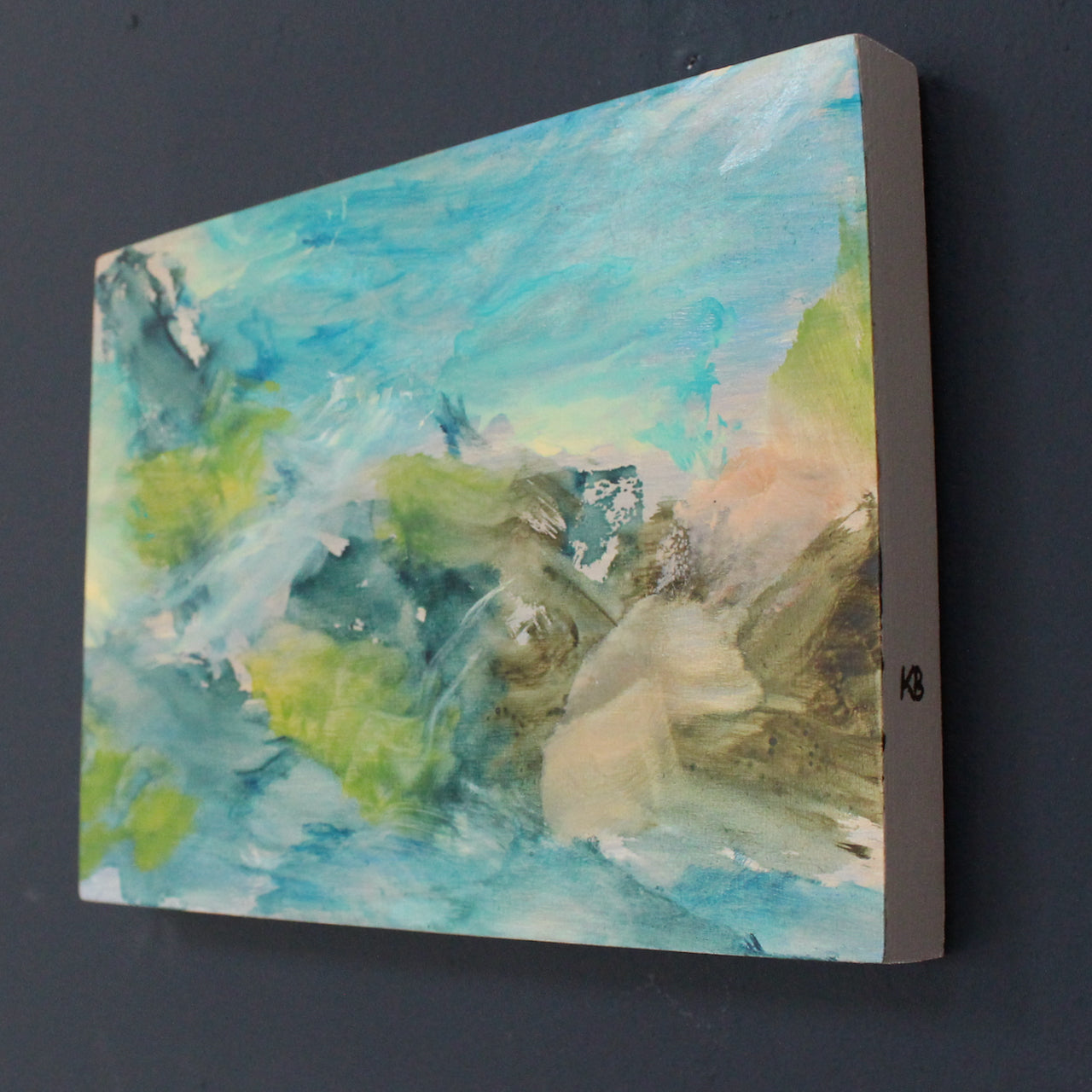 Cornwall inspired coastal painting by Katy Brown with bright blue, soft pink and green tones