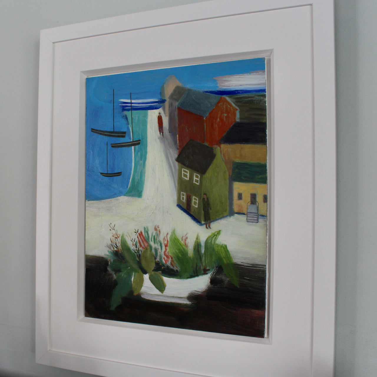 harbour coastal painting by Cornish artist with red, yellow and green houses.