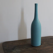 a turquoise coloured ceramic bottle by UK ceramic artist Lucy Burley