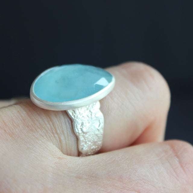 Aquamarine ring in textured sterling silver by Carin Lindberg on finger
