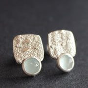 Square textured studs with Aquamine by Carin Lindeberg