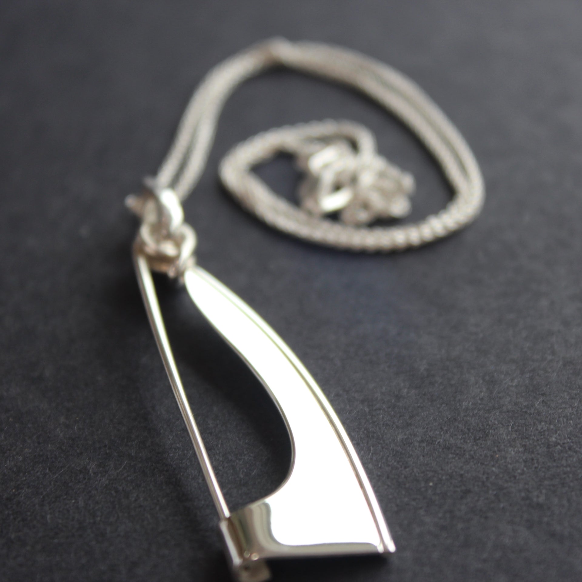 Abstract silver Ancien pendant/brooch by Beverly Bartlett