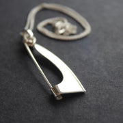 Abstract silver Ancien pendant/brooch by Beverly Bartlett with chain