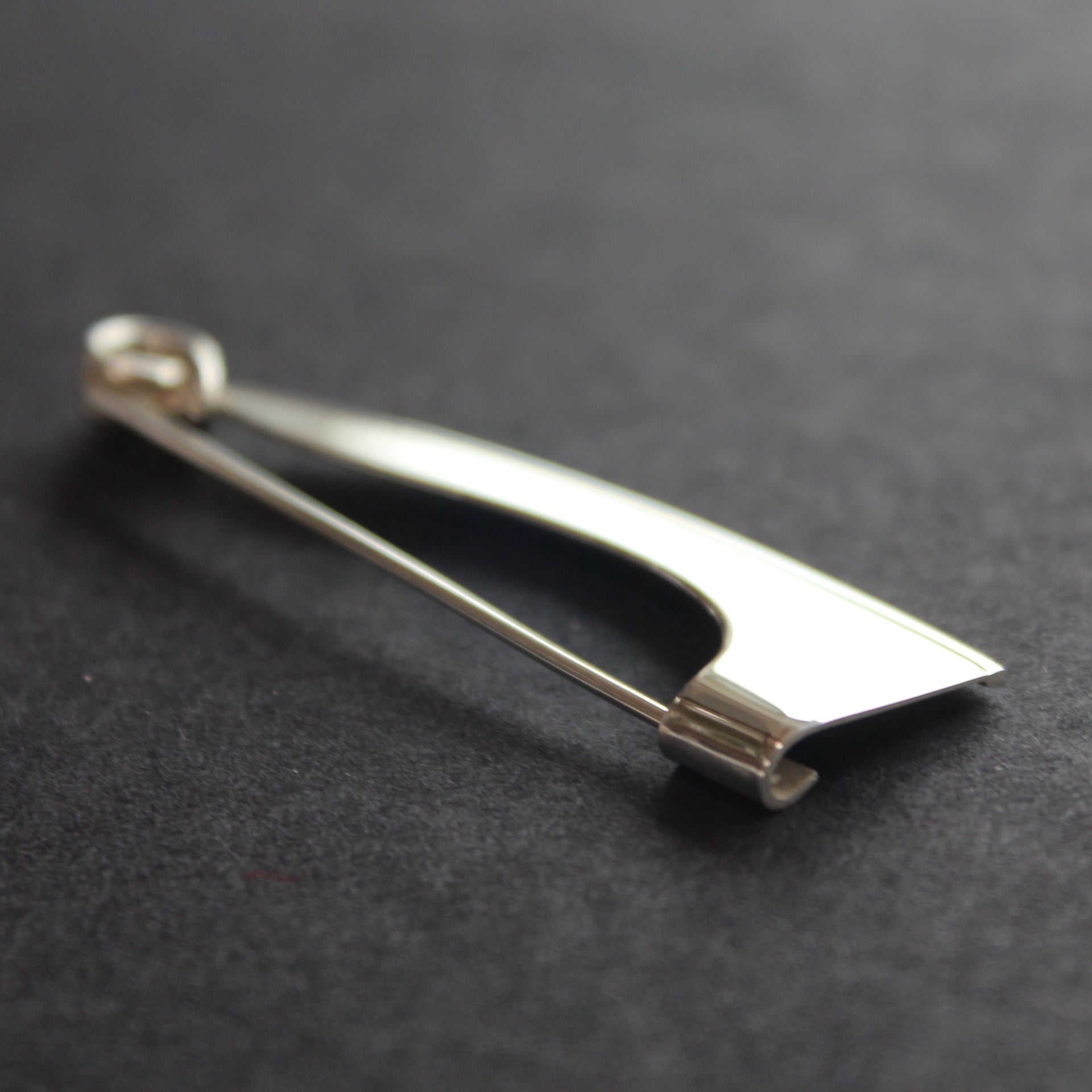 Abstract silver Ancien pendant/brooch by Beverly Bartlett