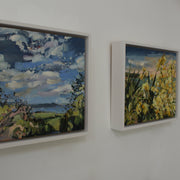 Two framed landscape paintings of Rame Head in Cornwall by artist Jill Hudson