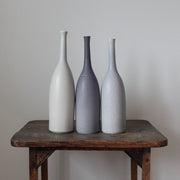 Trio of ceramic bottles in shades of grey by Lucy Burley