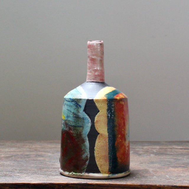 brightly coloured ceramic  bottle by well known potterJohn Pollex