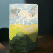 a green, blue, pink and yellow ceramic vase in the Nerikomi style by Essex based ceramic artist Judy McKenzie.