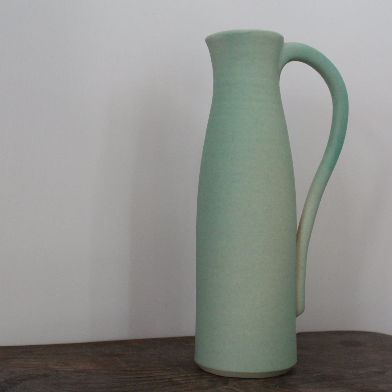 a Lucy Burley duck egg blue ceramic jug.